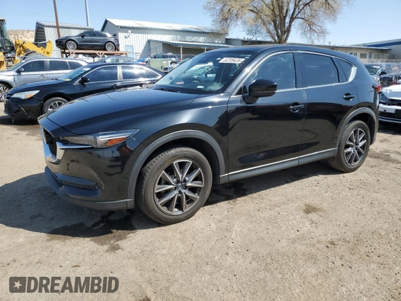 2018 Mazda CX-5 Grand Touring with VIN JM3KFADM9J1336792, listed as a Copart auction lot 52209435 with 107,852 mi miles and Salvage Title. Bid and sale history available at DreamBid. Image 1.