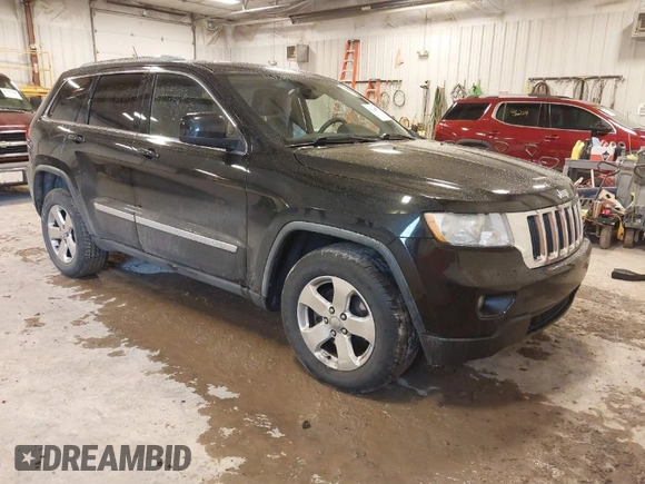 2012 Jeep Grand Cherokee Laredo with VIN 1C4RJFAT1CC225479, listed as a IAAI auction lot 41709911 with 227,150 mi miles. Bid and sale history available at carsss.com. Image 1.