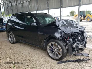 2020 BMW X7 M50i z VIN 5UXCX6C06LLE35455, wystawiony jako Copart lot #54965075 z przebiegiem Nie podano mil oraz Szkoda całkowita • Salvage title. Historia ofert i sprzedaży dostępna na DreamBid. Obrazek 4.
