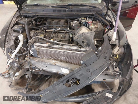 2014 Ford Taurus Limited с VIN 1FAHP2J84EG112559, выставлен на аукционе IAAI как лот 41162048 с пробегом 184 301 миль миль и . История ставок и продаж доступна на DreamBid. Изображение 10.