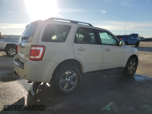 2011 Ford Escape Limited with VIN 1FMCU9EG0BKB89084, listed as a Copart auction lot 87066594 with 112,625 mi miles and Salvage Title. Bid and sale history available at DreamBid. Image 3.