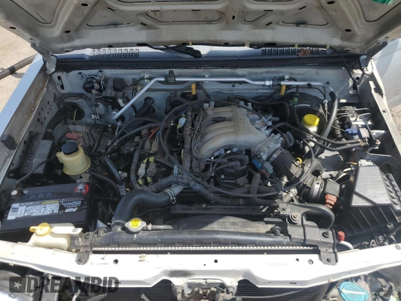 2001 Nissan Frontier SE with VIN 1N6ED27T51C311894, listed as a Copart auction lot 56281465 with 151,361 mi miles and Salvage title. Bid and sale history available at DreamBid. Image 11.