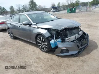 2019 Nissan Altima 2.5 Platinum with VIN 1N4BL4FV1KC104563, listed as a IAAI auction lot 41828774 with 44,006 mi miles. Bid and sale history available at carsss.com. Image 1.