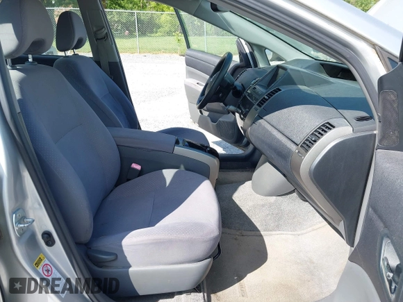 2007 Toyota Prius with VIN JTDKB20U777634652, listed as a IAAI auction lot 42182657 with 200,657 mi miles and . Bid and sale history available at DreamBid. Image 5.
