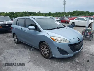 2012 Mazda 5 Sport with VIN JM1CW2BL4C0130446, listed as a IAAI auction lot 42215533 with 238,221 mi miles and . Bid and sale history available at DreamBid. Image 1.