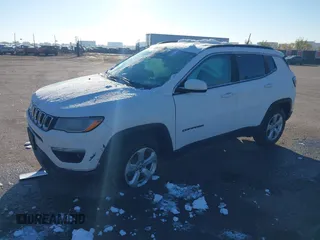 2019 Jeep Compass Latitude with VIN 3C4NJDBB5KT704564, listed as a IAAI auction lot 40768531 with 95,291 mi miles. Bid and sale history available at carsss.com. Image 2.