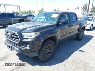 2018 Toyota Tacoma SR5 with VIN 3TMAZ5CN1JM061127, listed as a IAAI auction lot 42012247 with 119,381 mi miles and . Bid and sale history available at DreamBid. Image 17.