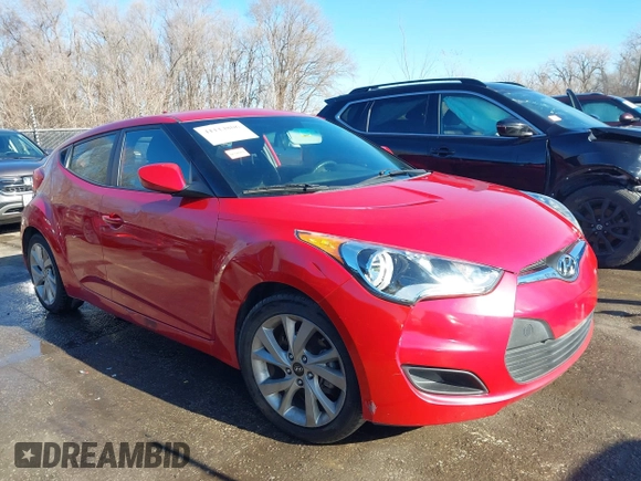 2016 Hyundai Veloster z VIN KMHTC6AD1GU260219, wystawiony jako IAAI lot #41114806 z przebiegiem 128 000 mil mil oraz . Historia ofert i sprzedaży dostępna na DreamBid. Obrazek 14.