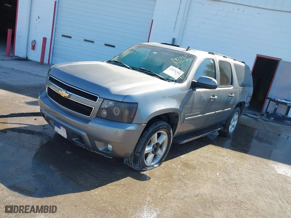 2007 Chevrolet Suburban LTZ with VIN 3GNFC16087G242868, listed as a IAAI auction lot 41872386 with 203,525 mi miles. Bid and sale history available at carsss.com. Image 2.