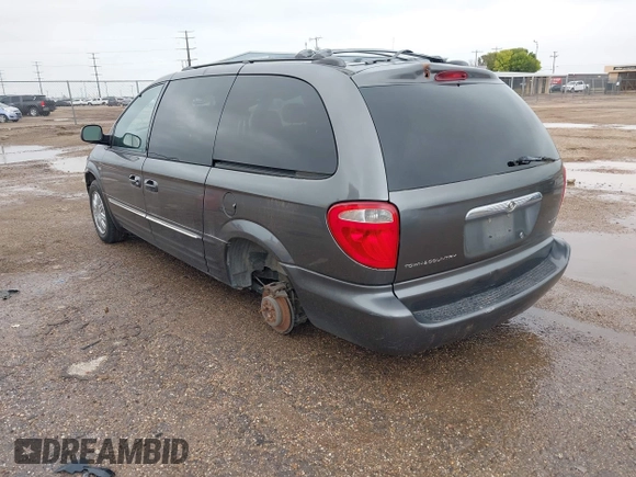 2004 Chrysler Town & Country Touring z VIN 2C4GP54L64R548091, wystawiony jako IAAI lot #42100811 z przebiegiem 251 192 mil mil oraz . Historia ofert i sprzedaży dostępna na DreamBid. Obrazek 3.