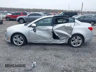 2011 Chevrolet Cruze LTZ with VIN 1G1PH5S95B7244973, listed as a IAAI auction lot 41962705 with 89,559 mi miles and . Bid and sale history available at DreamBid. Image 14.