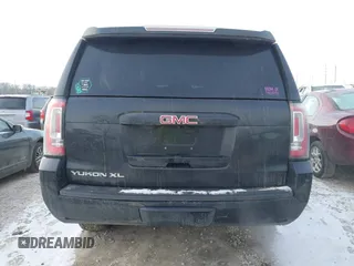 2015 GMC Yukon XL SLT with VIN 1GKS2HKC6FR257133, listed as a IAAI auction lot 41385913 with 150,238 mi miles. Bid and sale history available at carsss.com. Image 16.