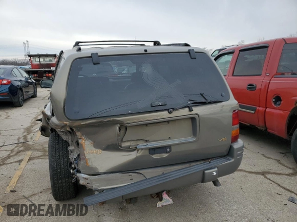 1997 Jeep Grand Cherokee Limited with VIN 1J4GZ78Y3VC568413, listed as a Copart auction lot 86171124 with 104,558 mi miles and Salvage Title. Bid and sale history available at carsss.com. Image 6.