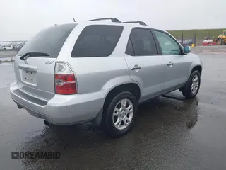 2005 Acura MDX Touring with VIN 2HNYD18975H524002, listed as a IAAI auction lot 41526015 with 228,019 mi miles. Bid and sale history available at carsss.com. Image 4.