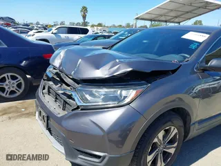2018 Honda CR-V LX with VIN 2HKRW5H30JH407287, listed as a IAAI auction lot 41866888 with 131,741 mi miles. Bid and sale history available at carsss.com. Image 6.
