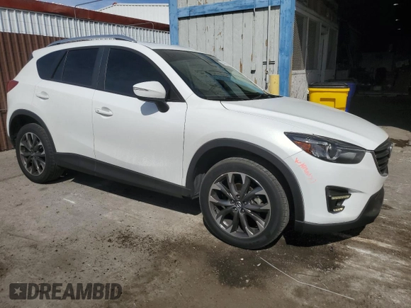 2016 Mazda CX-5 Grand Touring with VIN JM3KE4DY9G0662369, listed as a Copart auction lot 53169895 with 160,784 mi miles and Salvage Title. Bid and sale history available at carsss.com. Image 4.