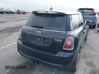 2007 MINI Hardtop S with VIN WMWMF73557TT80376, listed as a IAAI auction lot 42067228 with 174,262 mi miles and . Bid and sale history available at DreamBid. Image 4.