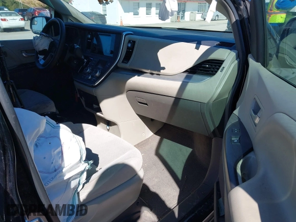 2016 Toyota Sienna LE AAS with VIN 5TDKK3DC1GS697730, listed as a IAAI auction lot 41727769 with 135,469 mi miles. Bid and sale history available at carsss.com. Image 5.