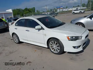 2011 Mitsubishi Lancer GTS with VIN JA32U8FW8BU030591, listed as a IAAI auction lot 42226736 with 110,010 mi miles and . Bid and sale history available at carsss.com. Image 1.
