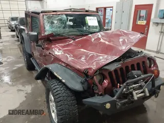 2007 Jeep Wrangler Unlimited Sahara z VIN 1J4GA59157L218278, wystawiony jako IAAI lot #41871773 z przebiegiem 145 992 mil mil oraz . Historia ofert i sprzedaży dostępna na DreamBid. Obrazek 6.