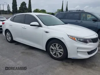 2016 Kia Optima LX with VIN 5XXGT4L32GG047624, listed as a IAAI auction lot 42068219 with 114,316 mi miles. Bid and sale history available at carsss.com. Image 13.