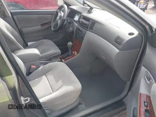 2004 Toyota Corolla CE with VIN 1NXBR32E84Z203320, listed as a IAAI auction lot 41851388 with 175,084 mi miles. Bid and sale history available at carsss.com. Image 5.