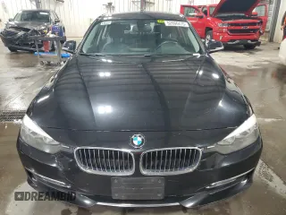 2015 BMW 3 Series 328i xDrive with VIN WBA3B3C50FJ984086, listed as a Copart auction lot 52006475 with 147,065 mi miles and Salvage Title. Bid and sale history available at carsss.com. Image 5.