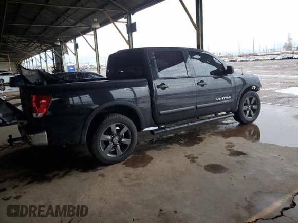 2015 Nissan Titan SL with VIN 1N6AA0ED1FN503994, listed as a Copart auction lot 39525224 with 104,353 mi miles and Salvage Title. Bid and sale history available at DreamBid. Image 3.