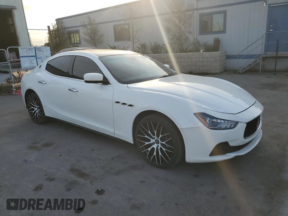 2014 Maserati Ghibli z VIN ZAM57XSA6E1097525, wystawiony jako Copart lot #42029695 z przebiegiem 93 740 mil mil oraz Szkoda całkowita • Salvage title. Historia ofert i sprzedaży dostępna na DreamBid. Obrazek 4.