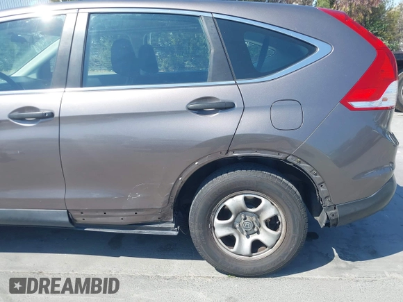 2013 Honda CR-V LX with VIN 3CZRM3H34DG705066, listed as a IAAI auction lot 42661478 with 318,027 mi miles and . Bid and sale history available at DreamBid. Image 20.