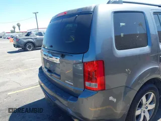 2013 Honda Pilot Touring with VIN 5FNYF3H94DB024069, listed as a IAAI auction lot 42638568 with 190,326 mi miles and . Bid and sale history available at DreamBid. Image 4.
