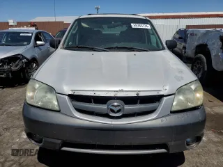2004 Mazda Tribute LX with VIN 4F2YZ941X4KM21993, listed as a Copart auction lot 69283134 with 222,736 mi miles and Clean Title. Bid and sale history available at carsss.com. Image 5.