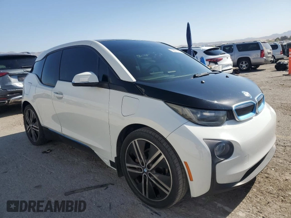 2014 BMW i3 with VIN WBY1Z4C51EV276642, listed as a Copart auction lot 52571115 with 112,178 mi miles and Salvage title. Bid and sale history available at DreamBid. Image 4.