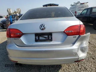 2014 Volkswagen Jetta SE с VIN 3VWD17AJ9EM437088, выставлен на аукционе Copart как лот 64810275 с пробегом 92 165 миль миль и Списание • Salvage title. История ставок и продаж доступна на DreamBid. Изображение 6.