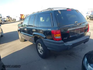 2001 Jeep Grand Cherokee Laredo with VIN 1J4GW48S51C517217, listed as a IAAI auction lot 41773968 with 189,350 mi miles. Bid and sale history available at carsss.com. Image 3.
