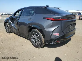 2023 Lexus RZ with VIN JTJAAAAB0PA004493, listed as a Copart auction lot 65047984 with 6,033 mi miles and Salvage Title. Bid and sale history available at carsss.com. Image 2.