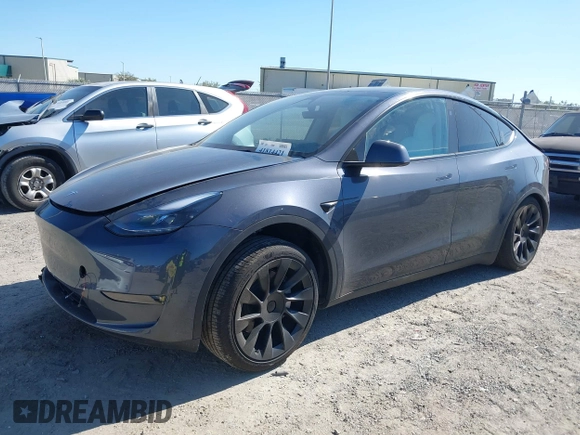 2023 Tesla Model Y Long Range with VIN 7SAYGDEE1PA203937, listed as a IAAI auction lot 41814421 with 9,138 mi miles. Bid and sale history available at carsss.com. Image 16.