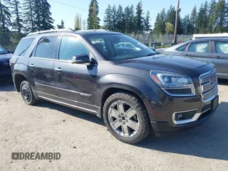 2016 GMC Acadia Denali with VIN 1GKKVTKD5GJ183951, listed as a IAAI auction lot 42062121 with 166,582 mi miles. Bid and sale history available at carsss.com. Image 1.