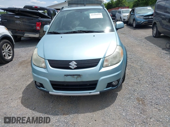 2009 Suzuki SX4 Touring AWD z VIN JS2YB417096201672, wystawiony jako IAAI lot #42209018 z przebiegiem 64 879 mil mil oraz . Historia ofert i sprzedaży dostępna na DreamBid. Obrazek 13.