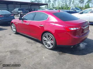 2015 Maserati Ghibli with VIN ZAM57XSA5F1129883, listed as a IAAI auction lot 41920750 with 63,739 mi miles. Bid and sale history available at carsss.com. Image 3.