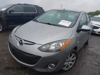 2011 Mazda 2 Sport with VIN JM1DE1HY1B0127409, listed as a IAAI auction lot 42015727 with 154,385 mi miles. Bid and sale history available at carsss.com. Image 2.