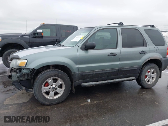 2006 Ford Escape XLT with VIN 1FMYU03126KC55897, listed as a IAAI auction lot 41733243 with 136,989 mi miles. Bid and sale history available at carsss.com. Image 14.