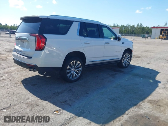 2023 GMC Yukon Denali with VIN 1GKS1DKL2PR303909, listed as a IAAI auction lot 42018679 with 65,532 mi miles. Bid and sale history available at carsss.com. Image 4.
