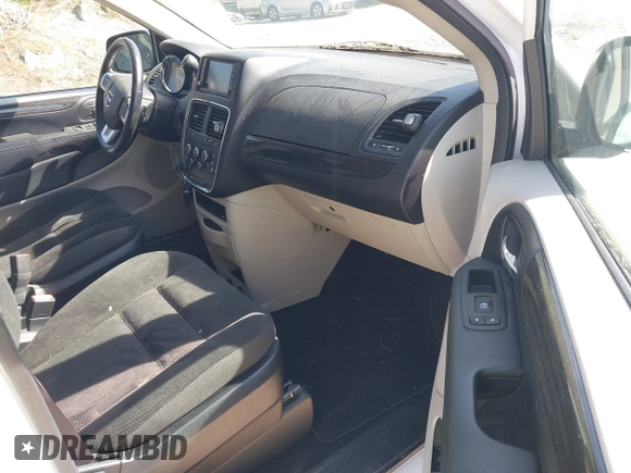 2019 Dodge Grand Caravan SE with VIN 2C4RDGBG8KR646829, listed as a IAAI auction lot 42136947 with 73,015 mi miles and . Bid and sale history available at DreamBid. Image 5.