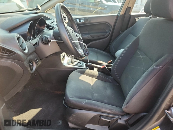2015 Ford Fiesta SE z VIN 3FADP4BJ2FM161312, wystawiony jako Copart lot #59104495 z przebiegiem 110 583 mil mil oraz Szkoda całkowita • Salvage title. Historia ofert i sprzedaży dostępna na DreamBid. Obrazek 7.