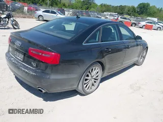 2013 Audi A6 3.0T Premium Plus with VIN WAUGGAFC5DN008487, listed as a IAAI auction lot 42043992 with 168,849 mi miles. Bid and sale history available at carsss.com. Image 4.