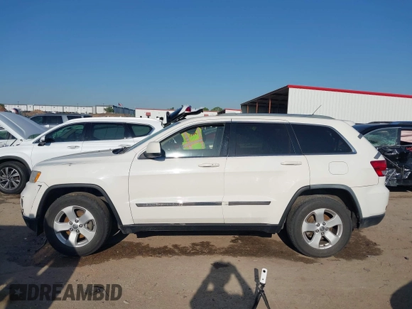 2011 Jeep Grand Cherokee Laredo with VIN 1J4RR4GG4BC703071, listed as a IAAI auction lot 41992878 with 126,199 mi miles and . Bid and sale history available at DreamBid. Image 14.