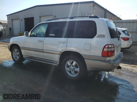 2004 Toyota Land Cruiser with VIN JTEHT05J542066724, listed as a Copart auction lot 74888234 with 244,845 mi miles and Salvage Title. Bid and sale history available at carsss.com. Image 2.