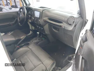 2012 Jeep Wrangler Unlimited Sahara with VIN 1C4BJWEG7CL275883, listed as a IAAI auction lot 42510764 with 149,531 mi miles and . Bid and sale history available at DreamBid. Image 5.