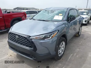 2023 Toyota Corolla Cross L with VIN 7MUAAAAG9PV047205, listed as a IAAI auction lot 41898077 with 29,184 mi miles and . Bid and sale history available at DreamBid. Image 2.